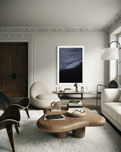 Load image into Gallery viewer, A modern living room featuring Limited Edition Beach Art Fine Art Prints titled 'Blue Waves' 1/25 by an award winning photographer. The print elegantly complements the minimalist decor style.