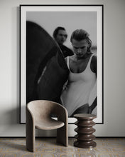 Load image into Gallery viewer, Euphoria Waves by Addison Jones Studio - a stylish minimalist room showcasing a bold black-and-white framed portrait of a female surfer, adding artistic flair.