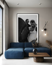 Load image into Gallery viewer, Euphoria Waves by Addison Jones Studio - a contemporary living area highlighting a captivating black-and-white photograph of a female surfer, framed beautifully.