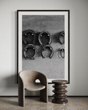 Load image into Gallery viewer, Limited Edition Western Art - Shoe Store 0217 Hand-Signed Artwork showcased in a stylish room with modern furnishings, emphasizing a framed print of horseshoes.