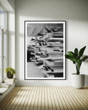 Load image into Gallery viewer, Beach Art: Surf School - A modern interior showcasing a bright, sunlit space with a striking black-and-white image of surfboards, perfect for beach lovers.