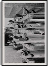 Load image into Gallery viewer, Beach Art: Surf School - A detailed close-up of surfboards arranged on a wooden rack in black-and-white, highlighting the artistry of surf culture.