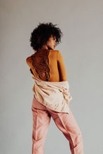 Load image into Gallery viewer, A model poses in a unique outfit showcasing her back in a stunning display of portrait photography titled "Tangerine" by Addison Jones Studio.