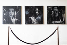 Load image into Gallery viewer, An exhibition display of three mixed media street art pieces on a gallery wall, emphasizing distinct portraits of women with dramatic shadows and textures.