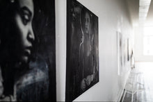 Load image into Gallery viewer, A full view of a mixed media street art portrait displayed on an easel, capturing its artistic essence and emotional depth.