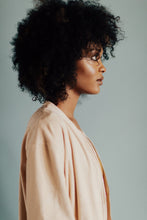 Load image into Gallery viewer, Framed Wall Art-Look to the Left
"Look to the Left" is a piece of modern portrait photography of a profile that was shot in-studio with one of a set of twins. This framed wall art is a limited edition, hand-signed piece with a certificate of authenticity.                                                                                       
E D I T I O N:
1/5