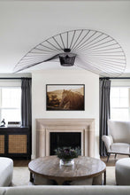 Load image into Gallery viewer, An elegantly styled living room featuring a framed artwork of a horse, exemplifying contemporary decor with a touch of Horse Art, placed above a beautifully crafted fireplace.