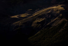 Load image into Gallery viewer, This landscape print named "Shadowy Swirls" was part of a landscape series shot in Patagonia. This is a limited edition, hand-signed piece with a certificate of authenticity. Abundant sharing will go to the iiilibervive foundation that helps support local + faire trade designers and artisans.
E D I T I O N:
1/25