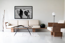 Load image into Gallery viewer, Modern living space with a large surf wall art piece showing surfers, adding a unique touch to the home decor.