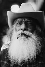 Load image into Gallery viewer, Street Art-Marlbaro Man artistic perspective focusing on the abstract elements and textures around the man's face.