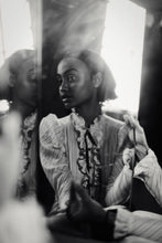 Load image into Gallery viewer, Fine Art Photography &#39;Echoing Heart&#39; - A striking black and white portrait reflecting a woman in ruffled attire, showcasing the depth of emotions captured in this limited edition photography.
