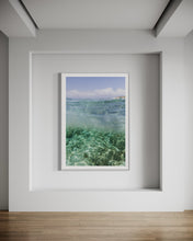 Load image into Gallery viewer, Framed Coastal Wall Art - Oceana II displayed elegantly in a modern room, showcasing the serene beauty of the ocean inspired by Turks and Caicos.
