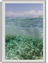 Load image into Gallery viewer, Close-up of the Framed Coastal Wall Art - Oceana II, emphasizing the clarity of the water and rocky seabed, perfect for coastal home decor.
