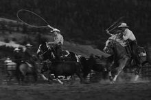 Load image into Gallery viewer, This piece of western art titled &quot;Strength in Motion&quot; was taken at a Rodeo in Grand Lake, Colorado. This is a limited edition, hand-signed piece with a certificate of authenticity

 E D I T I O N:
 1/25
